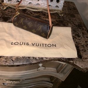 Authentic Louis Vuitton petite wristlet